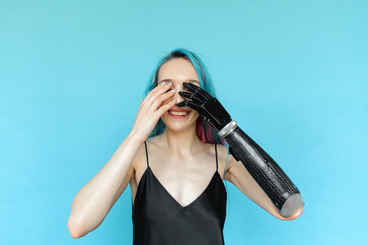 Woman in Black Spaghetti Strap Top Covering Her Eyes with Hands